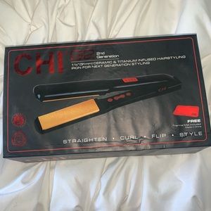 opened box but brand new CHI straightener